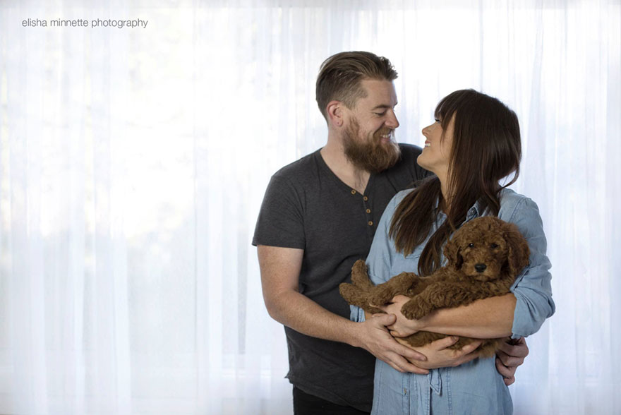 couple-does-photo-shoot-with-their-newborn-baby-dog